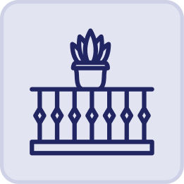 Simple line drawing of a potted plant on a balcony railing with geometric balusters, inspired by the Hatteras Grand Room at Sunset Inn, all enclosed in a rounded square border.
